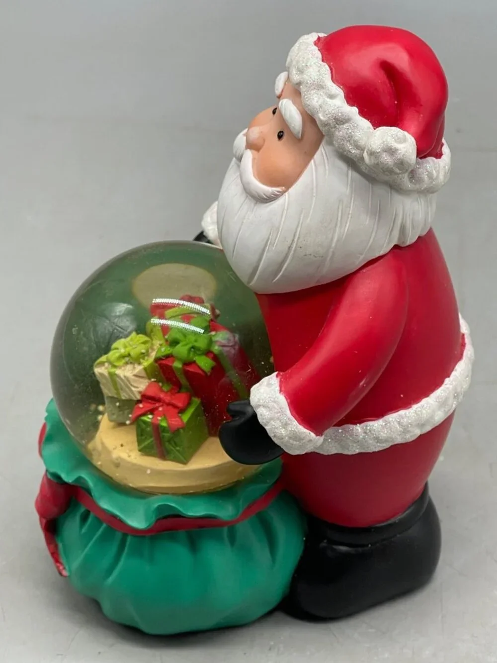 Christmas Santa snow globe figurine Santa bag present red green resin 6.5